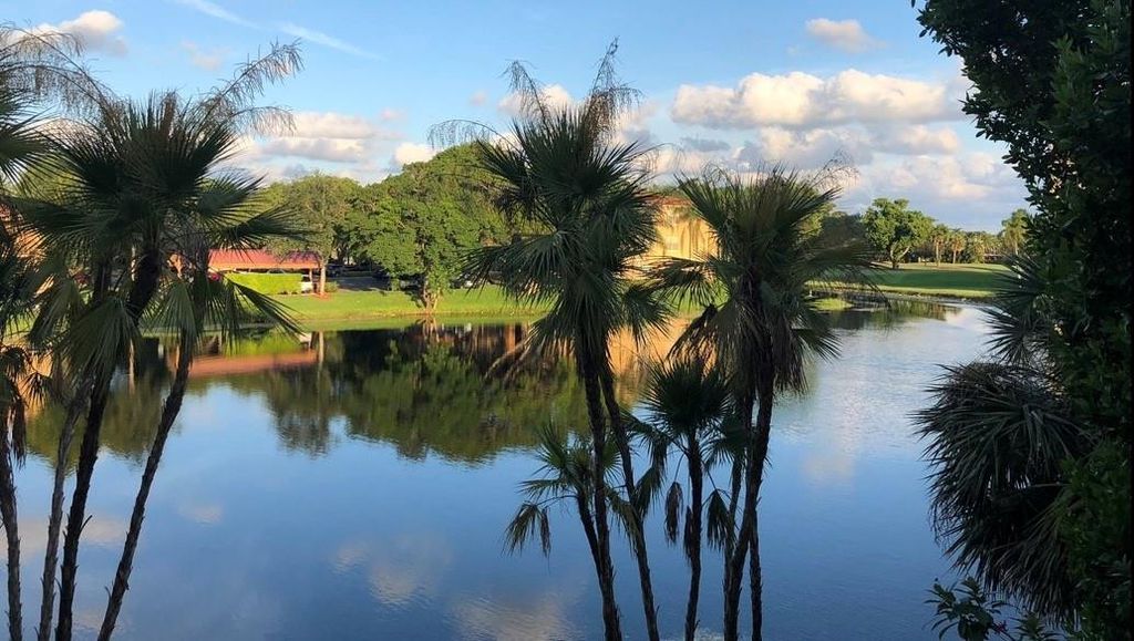 Photo of 150 Jacaranda Country Club Drive #202, Plantation, FL 33324 (MLS # F10458608)