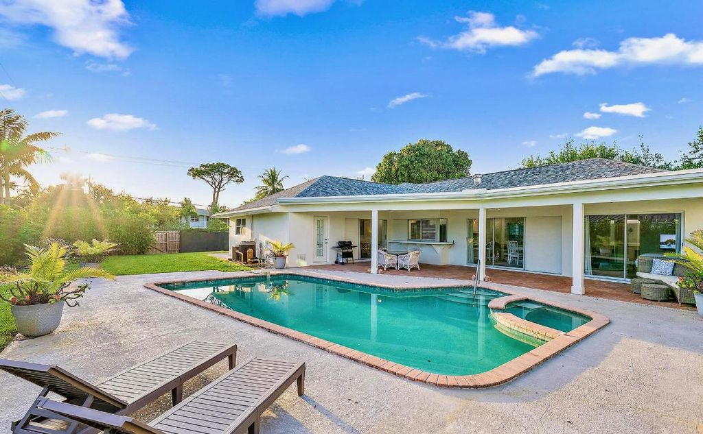 Photo of 305 Country Club Drive, Tequesta, FL 33469 (MLS # R10972172)