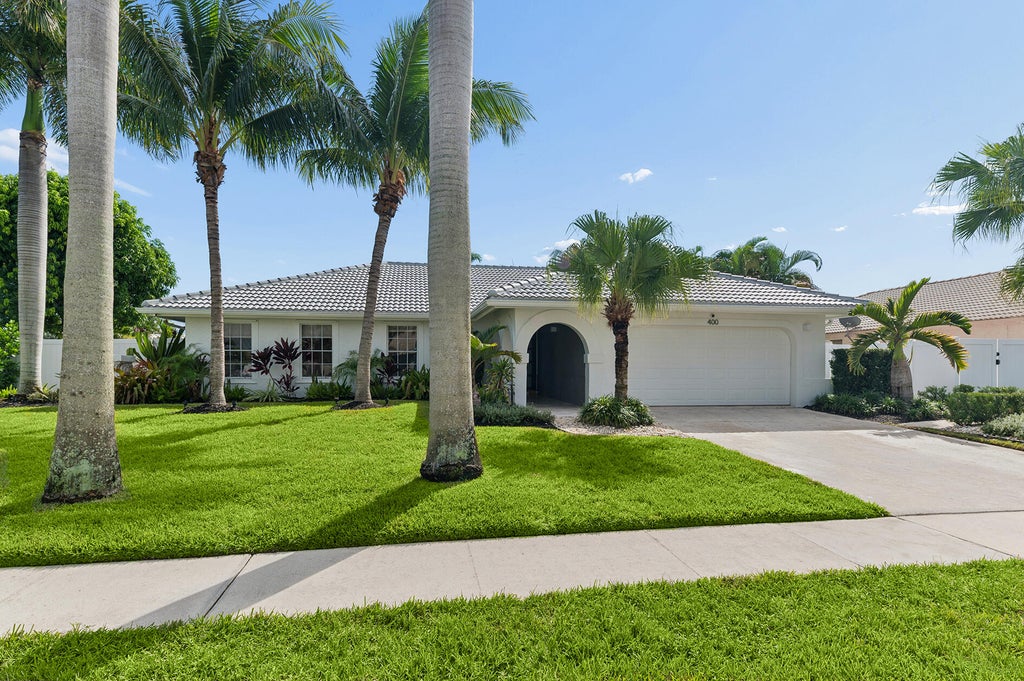 Photo of 400 NW 72ND Street, Boca Raton, FL 33487 (MLS # B26094661)