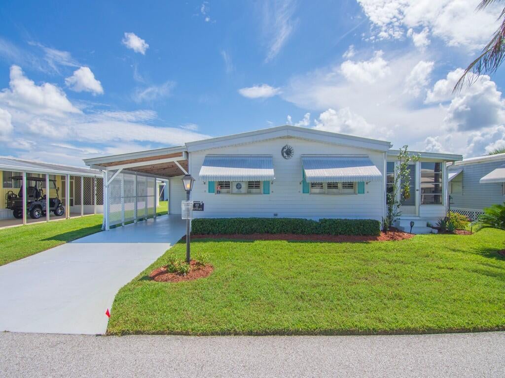 Photo of 212 NE Forrest Court, Jensen Beach, FL 34957 (MLS # B26073182)