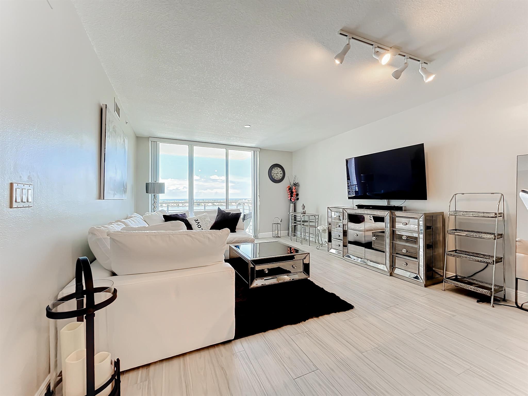 Discover unparalleled waterfront living in this stunning 1 bedroom, 1 bathroom condo offering breathtaking intracoastal /ocean views and resort-style amenities in the heart of downtown West Palm Beach. This unit comes fully furnished with water and internet included in the price of the rent. Enjoy the benefits of being close to shopping, beaches, restaurants, theaters and a quick ride to the airport. The Slade Condominium offers hotel quality amenities including two pools, a fitness center, valet parking, full-time staff, clubroom, game room and business center. Catch a glimpse of the sunrise as you have your morning coffee on the large balcony. Make an appointment to view your next home today!