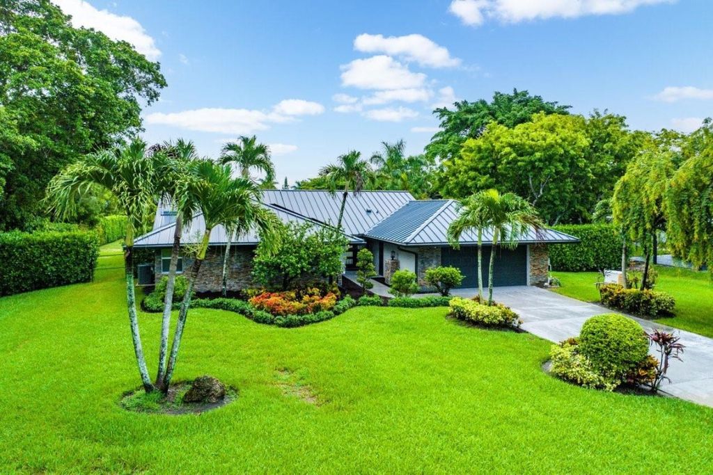 Photo of 5966 NW 77th Terrace, Parkland, FL 33067 (MLS # F10447811)
