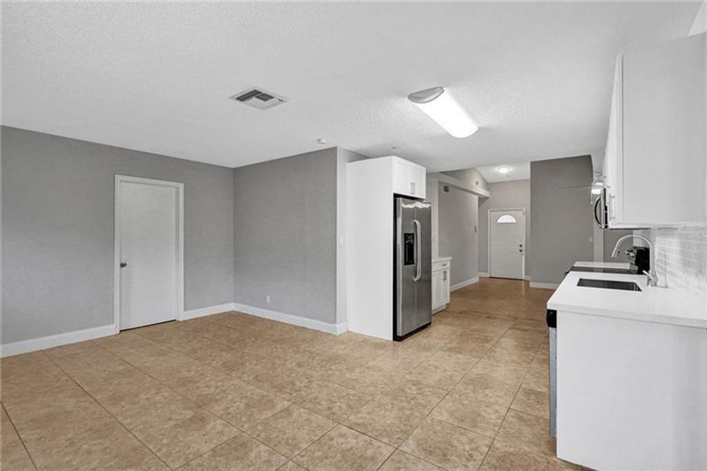 Photo of 8221 SW 3rd Court, North Lauderdale, FL 33068 (MLS # B26001369)