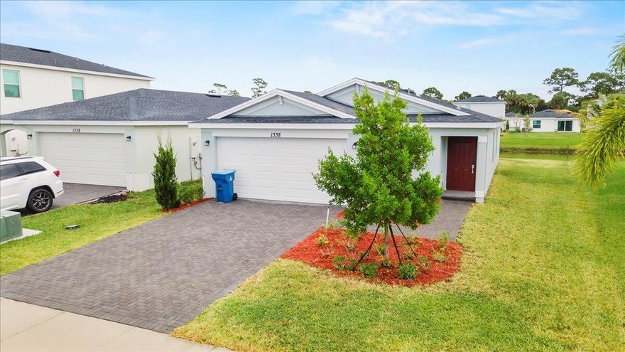 Beautiful brand-new home with lake view located in the desirable Tillman Lakes community of Palm Bay. This modern single-family residence offers 3 bedrooms, 2 full bathrooms, and a 2-car garage, featuring new appliances, elegant finishes, and a brand-new A/C system. The open floor plan with abundant natural light provides a comfortable and functional living space. Conveniently located near top-rated schools, hospitals, shopping centers, and I-95. Important: Only first month's rent and security deposit required. Tenant responsible for lawn maintenance. Move-in ready!