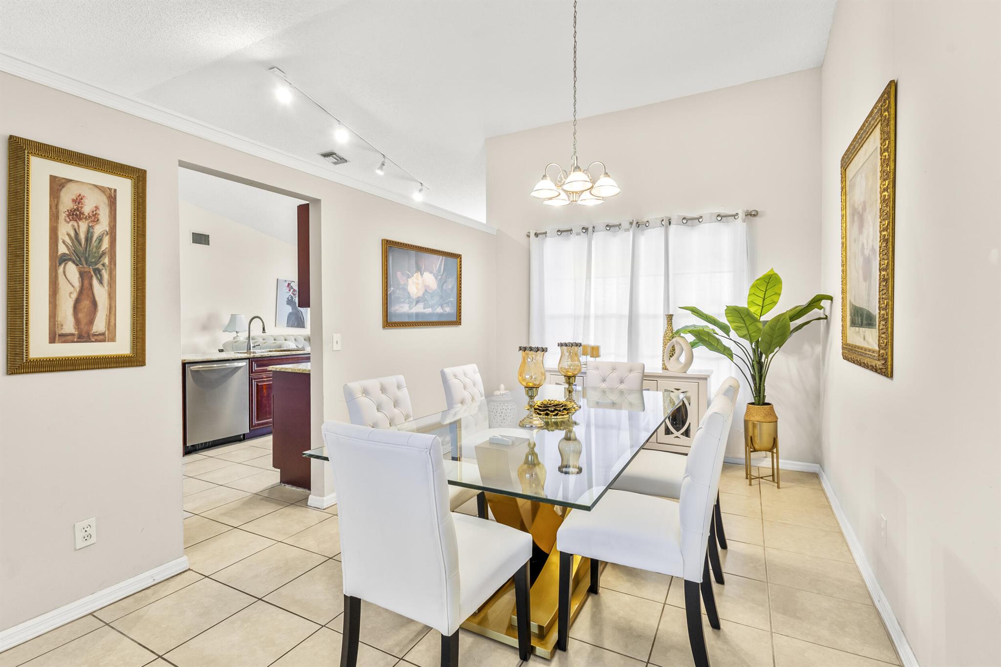 VERY MOTIVATED SELLER! Imagine a life where you can truly unwind--without the restrictions of an HOA. This charming 3-bedroom, 2-bathroom home has a NEW ROOF in a peaceful neighborhood is the perfect blend of comfort and convenience. This home features a high ceiling throughout, a BRAND NEW PRIVATE FENCED backyard, an enormous master bedroom and a large serene and screened patio. Inside includes a quasi open layout with a modern open-concept kitchen that's perfect for cooking and entertaining. Natural light pours into every room. The spacious master suite is a true retreat, featuring a luxurious tub and large walk-in shower, plus an impressive walk-in closet. The additional bedrooms offer plenty of space for children, guests, or a home office.Outside, your private, gated backyard awai