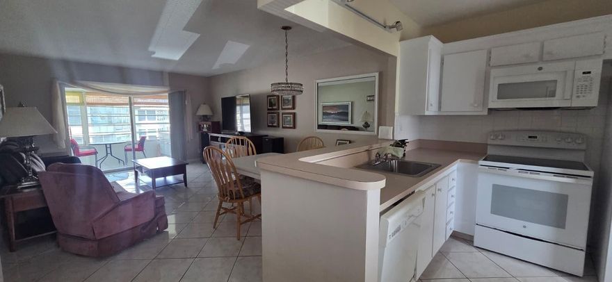 Beautifully maintained 2 bedroom, 2 bath condo in a desirable 55+ community! This very clean, move-in ready home is offered completely furnished for your convenience. Features include bright tile floors throughout, a spacious enclosed Florida room perfect for relaxing or entertaining, and well-manicured grounds that provide a serene setting. Enjoy the vibrant, active lifestyle this community offers with amenities, activities, and a welcoming atmosphere. Just bring your suitcase and start living the good life!