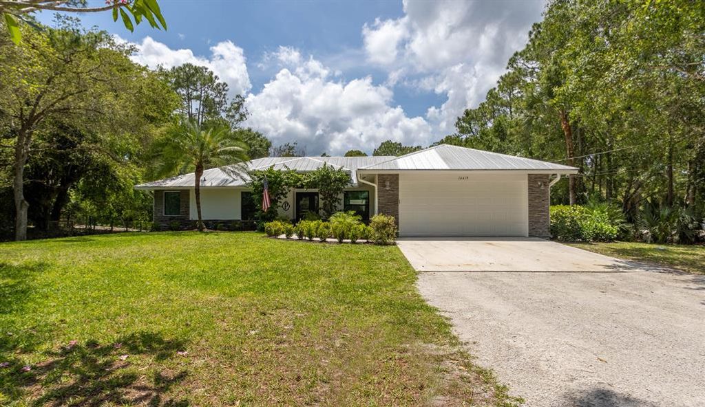 Photo of 16419 106th Terrace N, Jupiter, FL 33478 (MLS # R10890014)