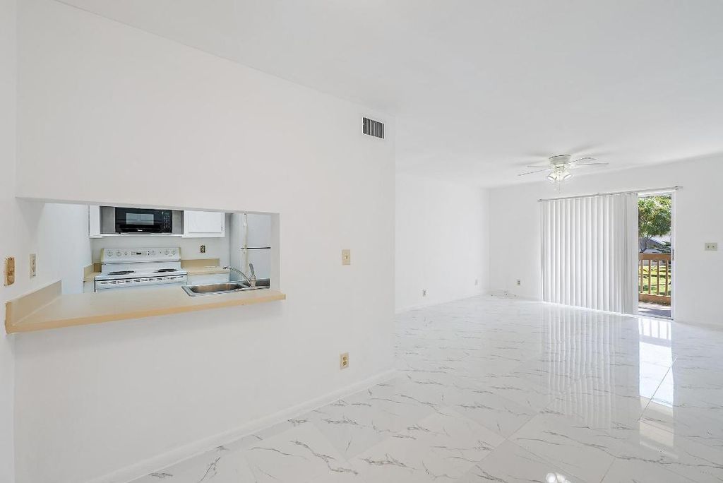 Photo of 1854 Abbey Road #202, West Palm Beach, FL 33415 (MLS # R11141026)