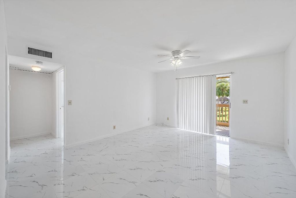 Photo of 1854 Abbey Road #202, West Palm Beach, FL 33415 (MLS # R11141026)