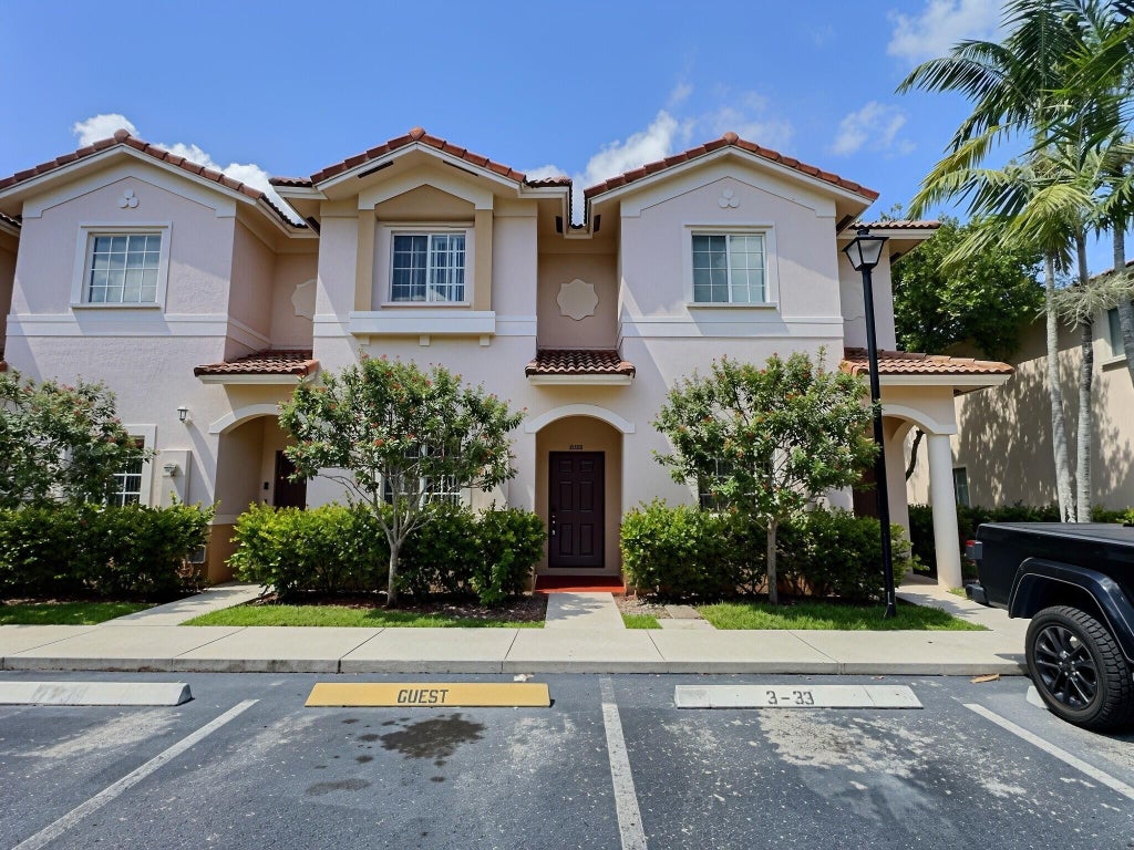 Photo of 8833 S ISLES Circle #8833, Tamarac, FL 33321 (MLS # B26063922)