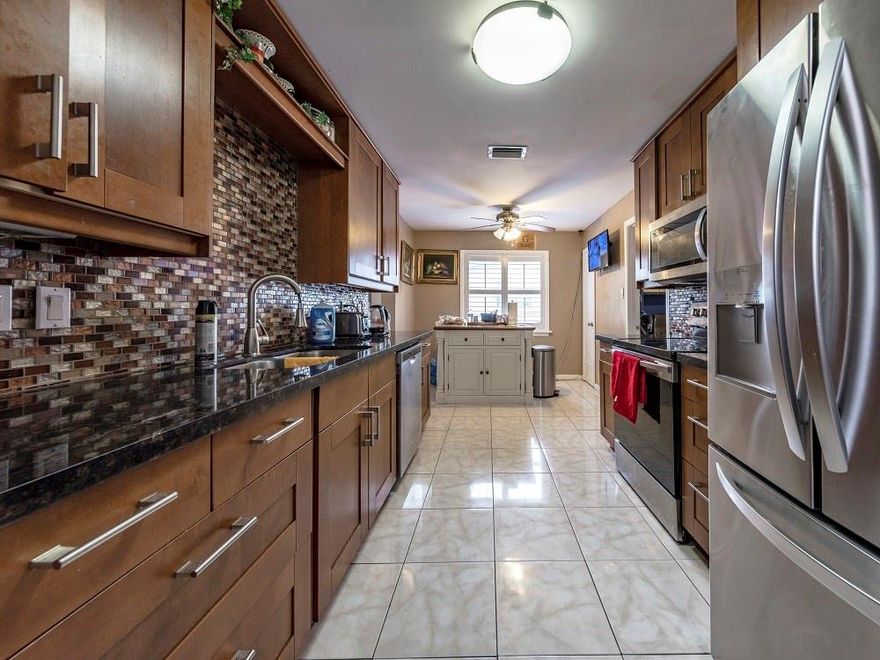 Great property conveniently located in Lauderhill. Partially lease. 4bedrooms, 4bathrooms and 2 full kitchens. This house was originally a 2 bedroom, 2 bath and 1 kitchen. Addition was legally done and passed all city inspections. Great home for multiple family, single family or an investor. Large bedrooms. Large walk-in closets. Large living room and dining room. Renovated considerably with permits. Garage partitioned can be a 5th bedroom or den or just converted back. Currently receiving $3,400 per month in rent while still living there. Viewing is only allowed after you drive by and view the neighborhood and viewing must be a contingency in a fully executed contract. Must have a pre-approval from your lender or proof of funds. Absolutely a great opportunity to invest. Seller relocating.