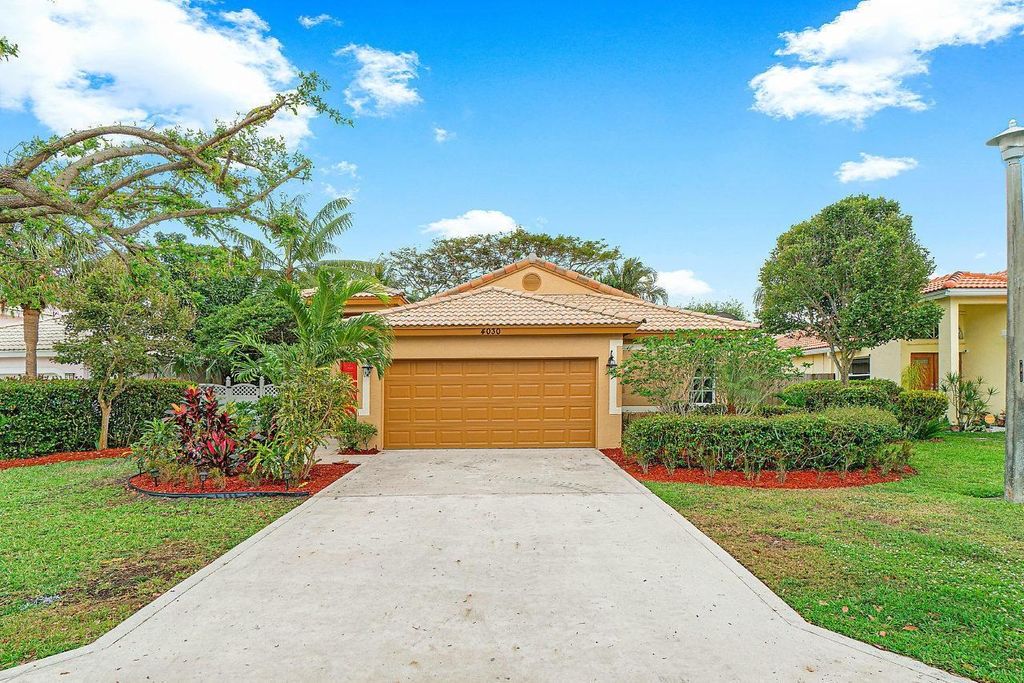 Photo of 4030 Laurelwood Lane, Delray Beach, FL 33445 (MLS # F10502210)