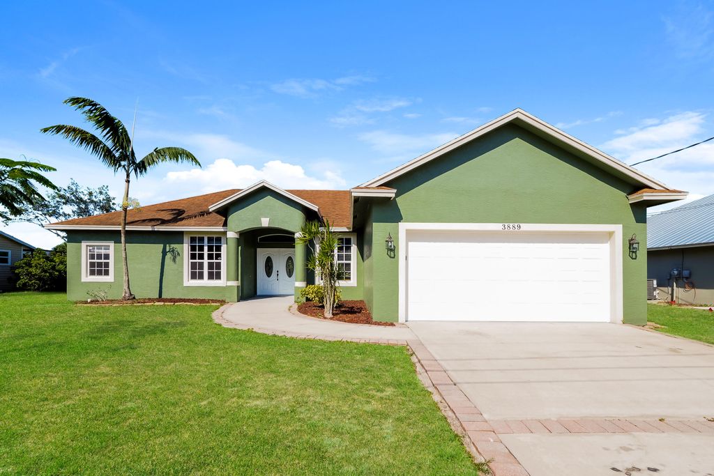 Photo of 3889 SW Wycoff Street, Port Saint Lucie, FL 34953 (MLS # R11147992)