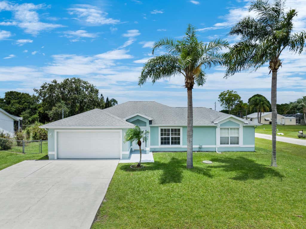Photo of 2297 SE Marsh Avenue, Port Saint Lucie, FL 34952 (MLS # B26050334)