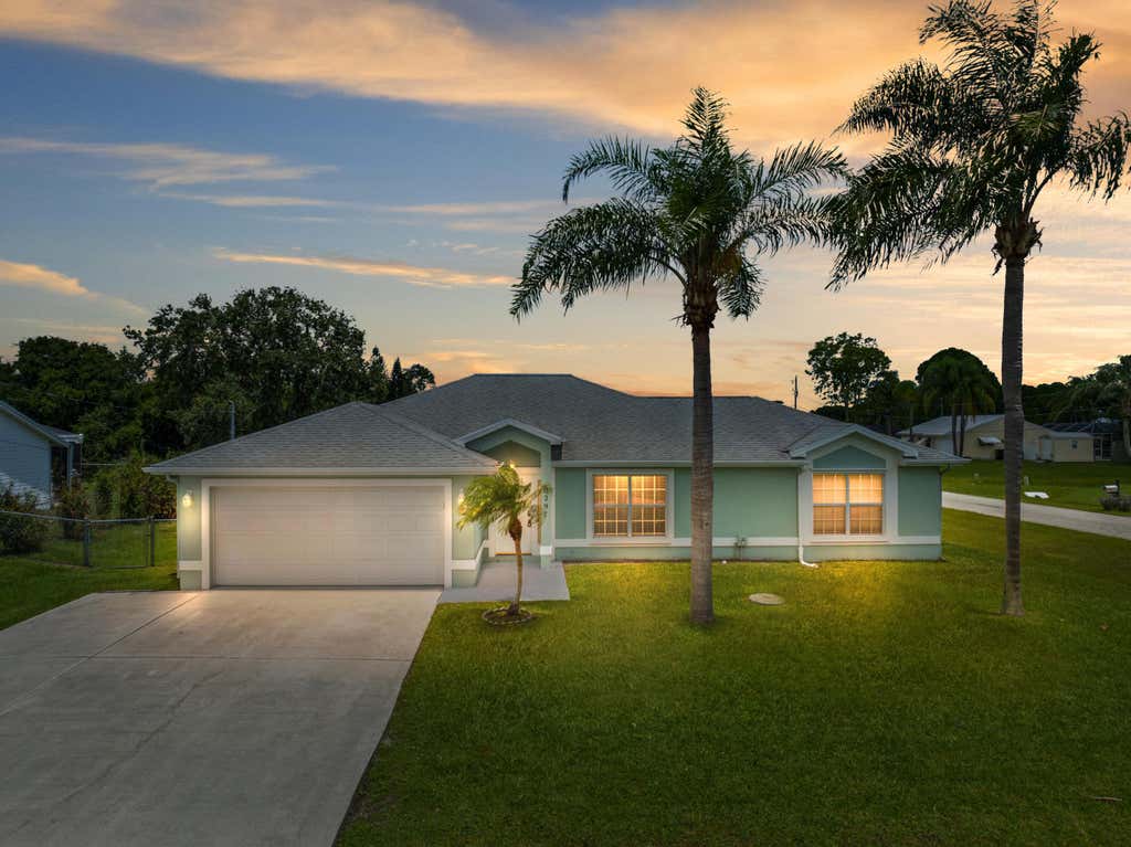 Photo of 2297 SE Marsh Avenue, Port Saint Lucie, FL 34952 (MLS # B26050334)