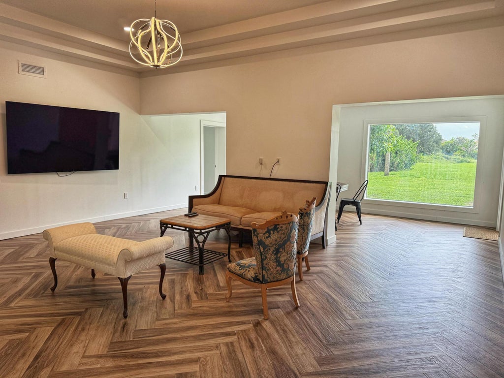 Photo of 8628 Pioneer Road, West Palm Beach, FL 33411 (MLS # B26086880)