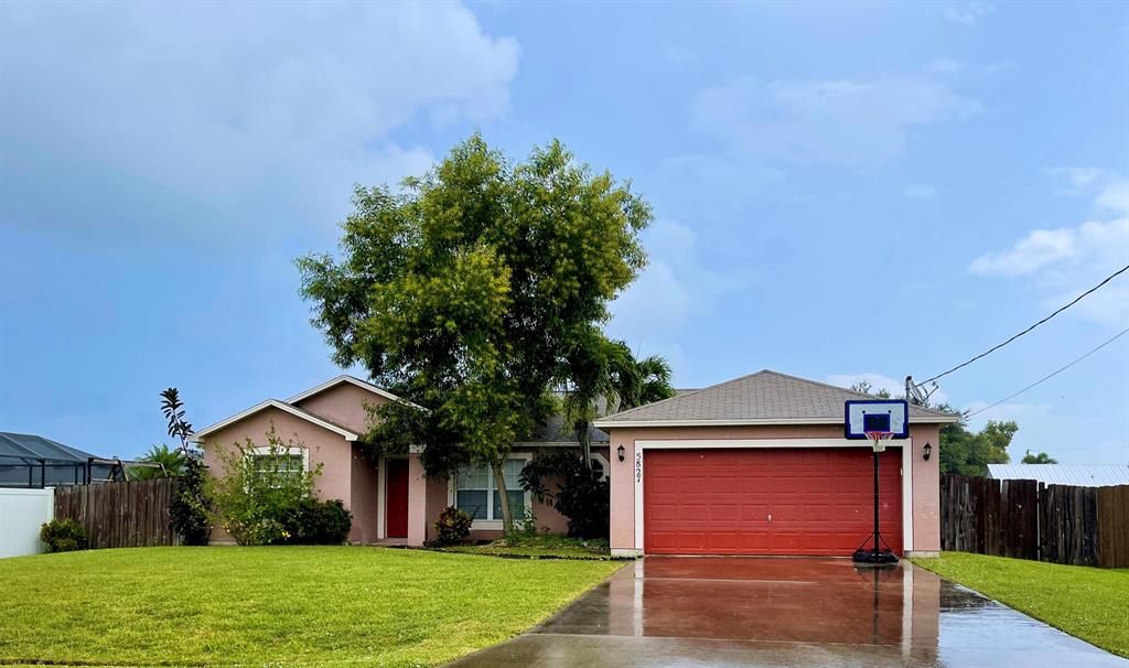 Photo of 5827 NW Dana Circle, Port Saint Lucie, FL 34986 (MLS # R10751182)