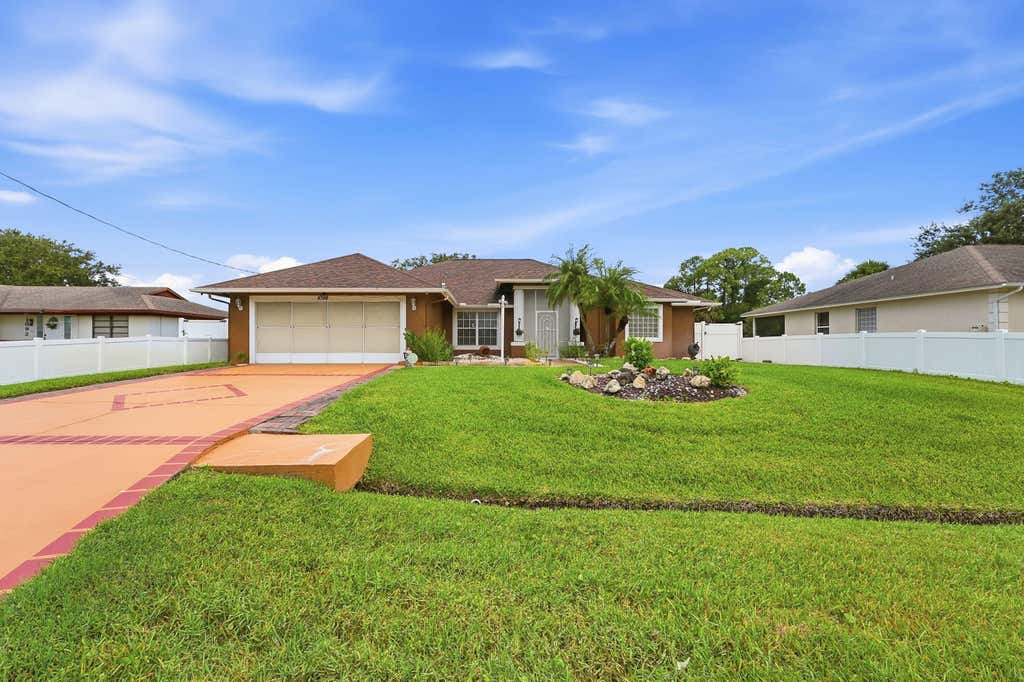 Photo of 1098 SW Sudder Avenue, Port Saint Lucie, FL 34953 (MLS # B26049531)