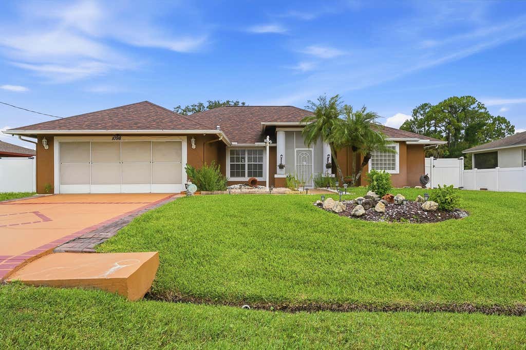 Photo of 1098 SW Sudder Avenue, Port Saint Lucie, FL 34953 (MLS # B26049531)