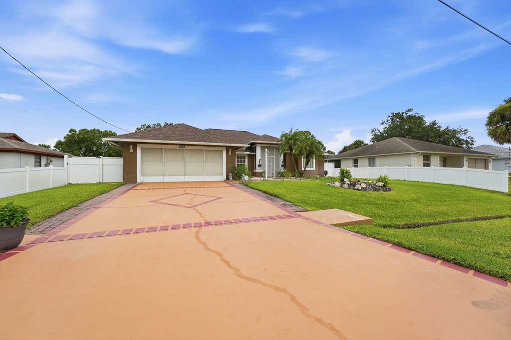 Photo of 1098 SW Sudder Avenue, Port Saint Lucie, FL 34953 (MLS # B26049531)