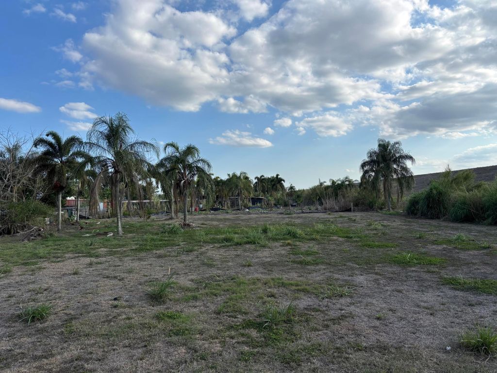 Photo of 0 Airport Road, Pahokee, FL 33476 (MLS # B26007746)