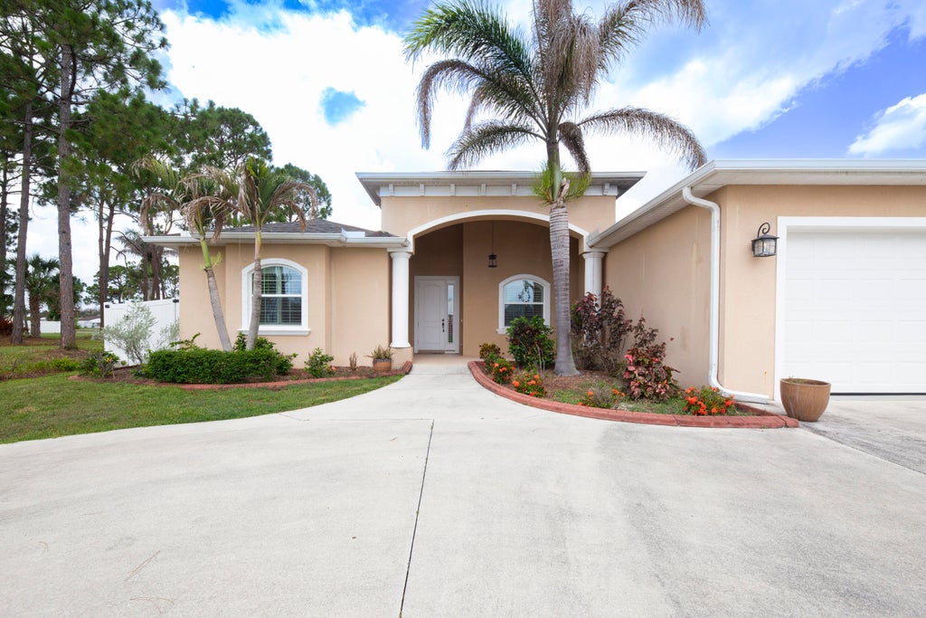 Photo of 6462 NW Colgate Street, Port Saint Lucie, FL 34986 (MLS # B26046899)