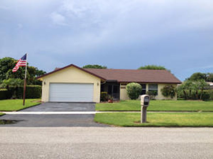 EXCELLENT 3 BR + LARGE DEN/OFFICE POOL HOME.  PRIVATE YARD W/AUTOMATIC SPRINKLER SYSTEM WHICH IS RUN OFF OF A WELL FOR LANDSCAPE.  HUGE ENCLOSED PATIO.  ALL WINDOWS & SLIDERS HAVE BEEN UPGRADED TO HURRICANE IMPACT GLASS.  GARAGE DOOR IS UP TO HURRICANE CODE WHICH WILL GIVE YOU BIG SAVINGS ON PROPERTY INS.  KITCHEN ADORNS CUSTOM OAK CABINETS W/NEWER COUNTERTOPS.  BEAUTIFUL HAMMERED LIGHT TILE THROUGH OUT & PLUSH CARPET IN ROOMS.  HOME IS IN FANTASTIC CONDITION & CARED FOR BY ORIGINAL OWNER.  COMMUNITY SITS BTWN LYONS RD. & 441 IN WEST BOCA RATON.