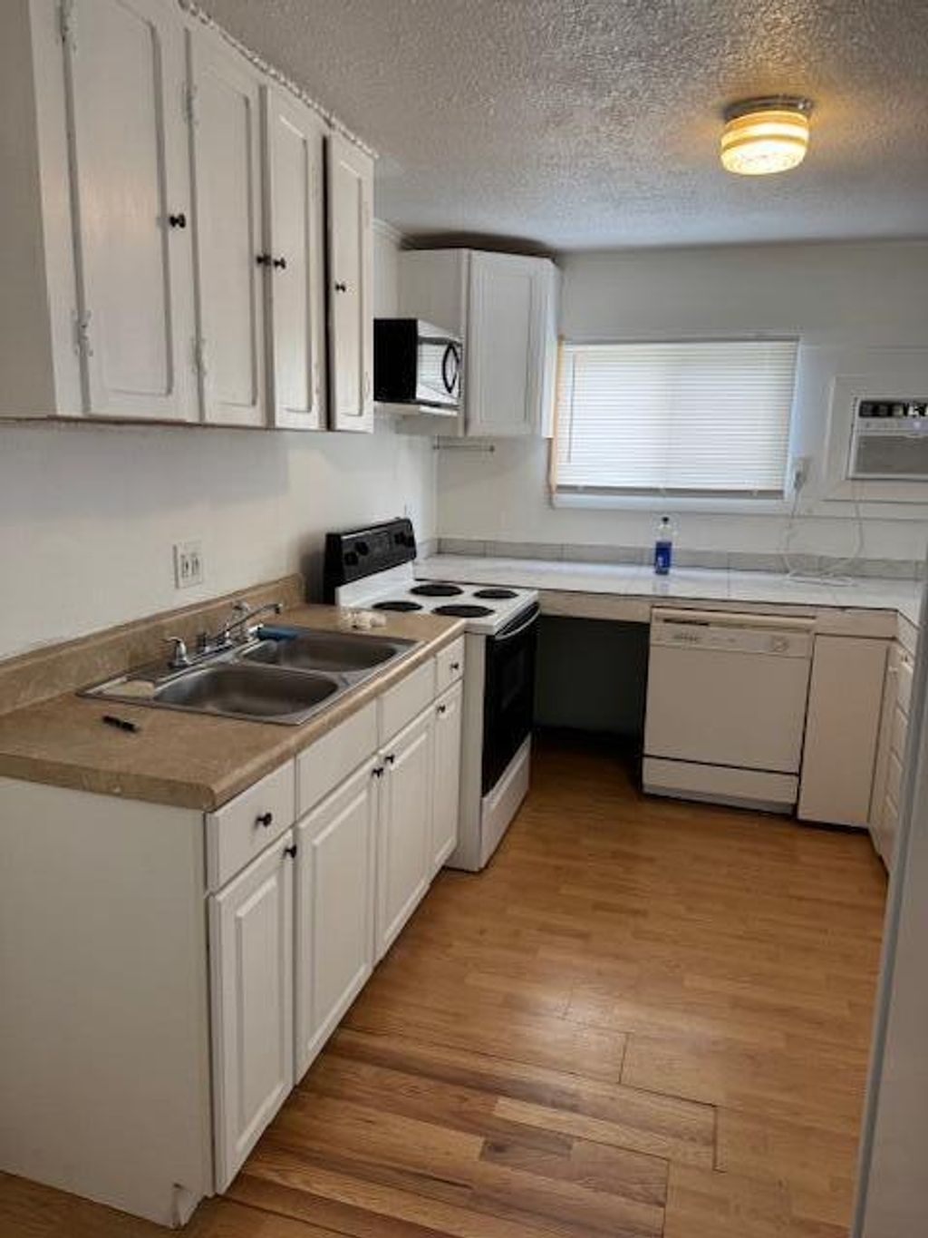 Photo of 2234 NE Pine Ridge Street, Jensen Beach, FL 34957 (MLS # R11069686)