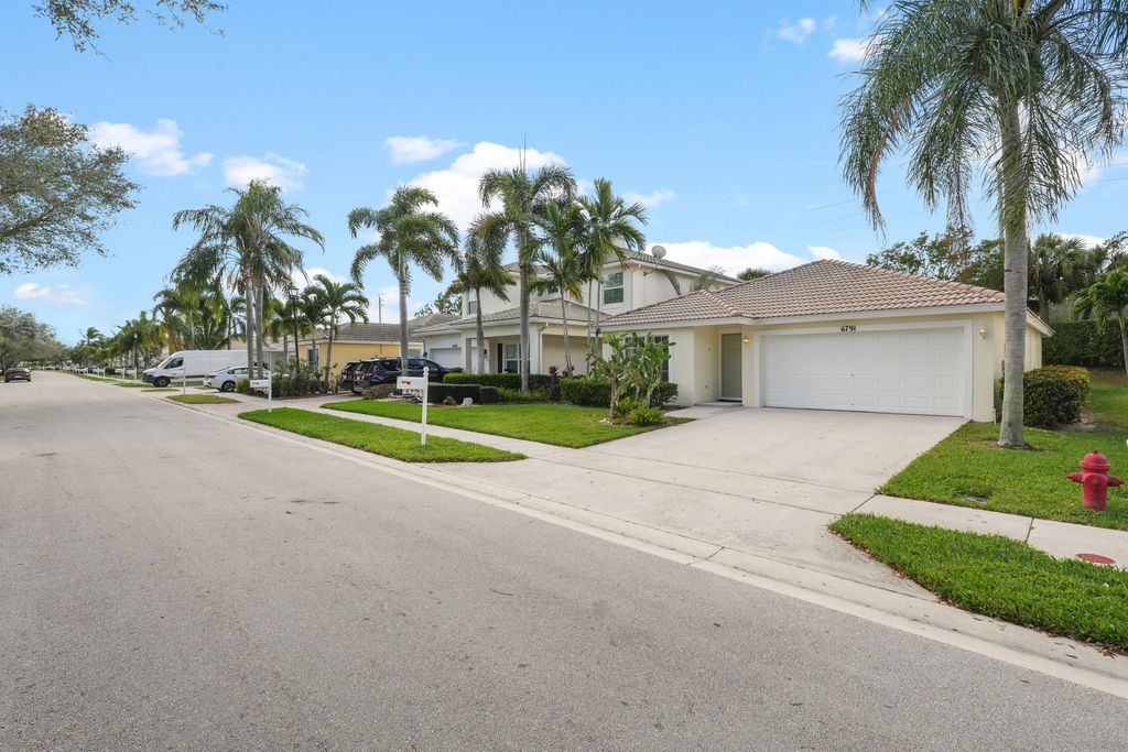 Photo of 6791 Lantern Key Drive, Lake Worth, FL 33463 (MLS # B26015098)