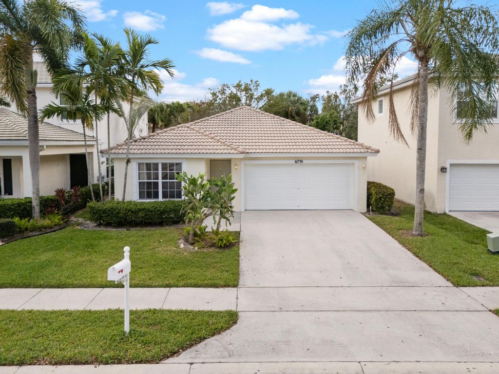 Photo of 6791 Lantern Key Drive, Lake Worth, FL 33463 (MLS # B26015098)
