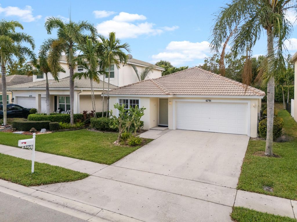 Photo of 6791 Lantern Key Drive, Lake Worth, FL 33463 (MLS # B26015098)