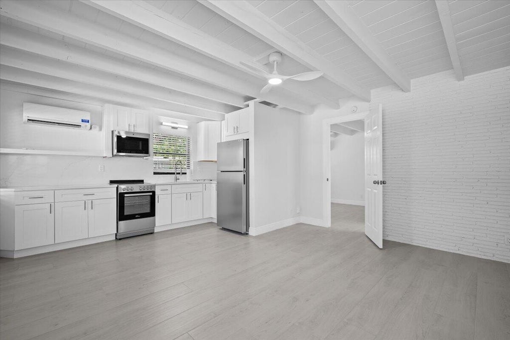 Photo of 1 TROPICAL Drive #3, Ocean Ridge, FL 33435 (MLS # B26074019)