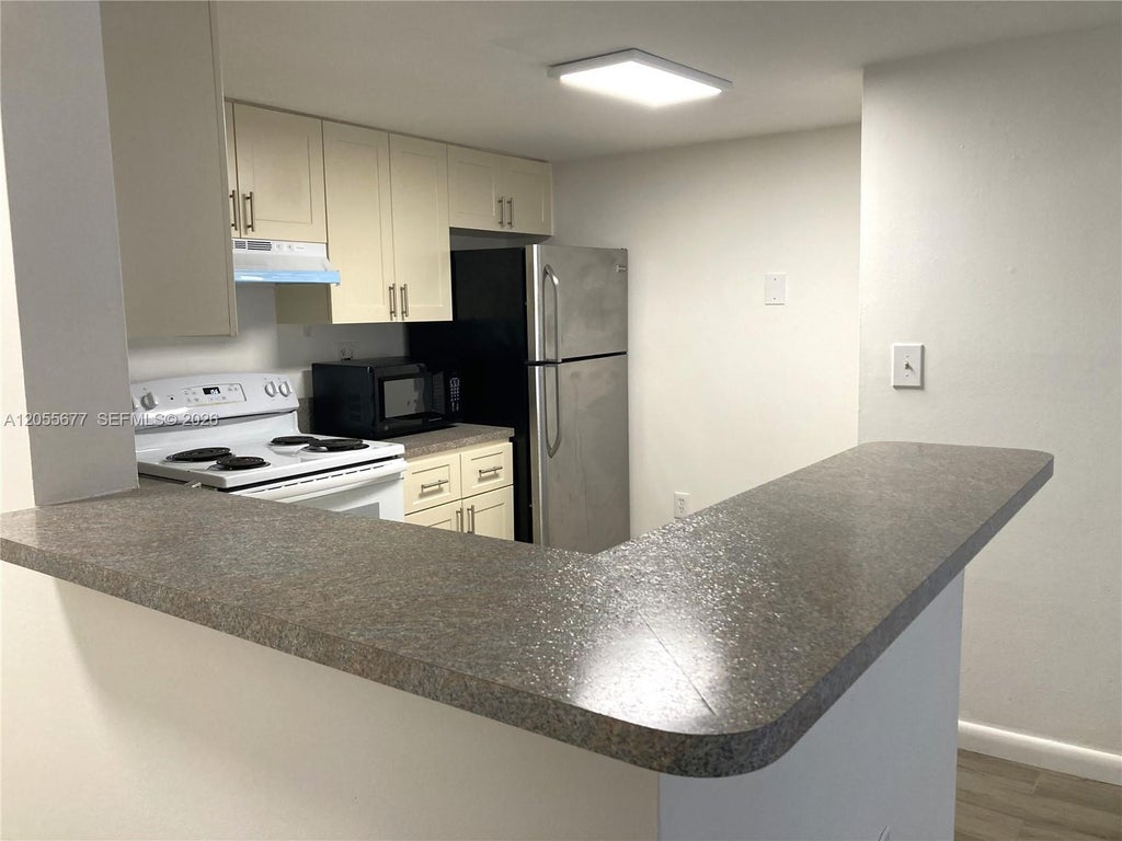 Photo of 9879 Nob Hill Court #9879, Sunrise, FL 33351 (MLS # A12055677)