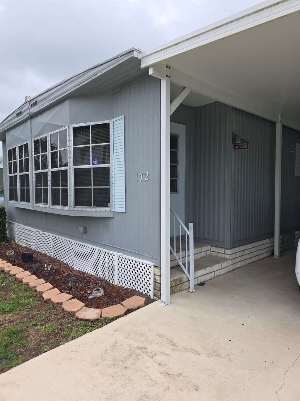 Photo of 172 W Carribean, Port Saint Lucie, FL 34952 (MLS # R11128945)