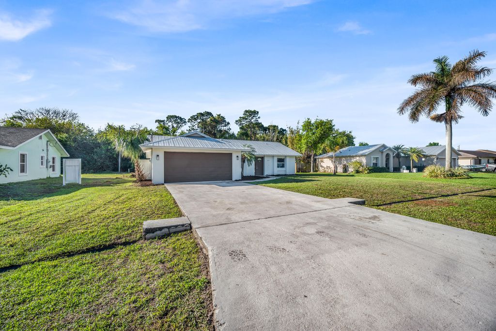 Photo of 2514 SE Alfonso Avenue, Port Saint Lucie, FL 34952 (MLS # R11166129)