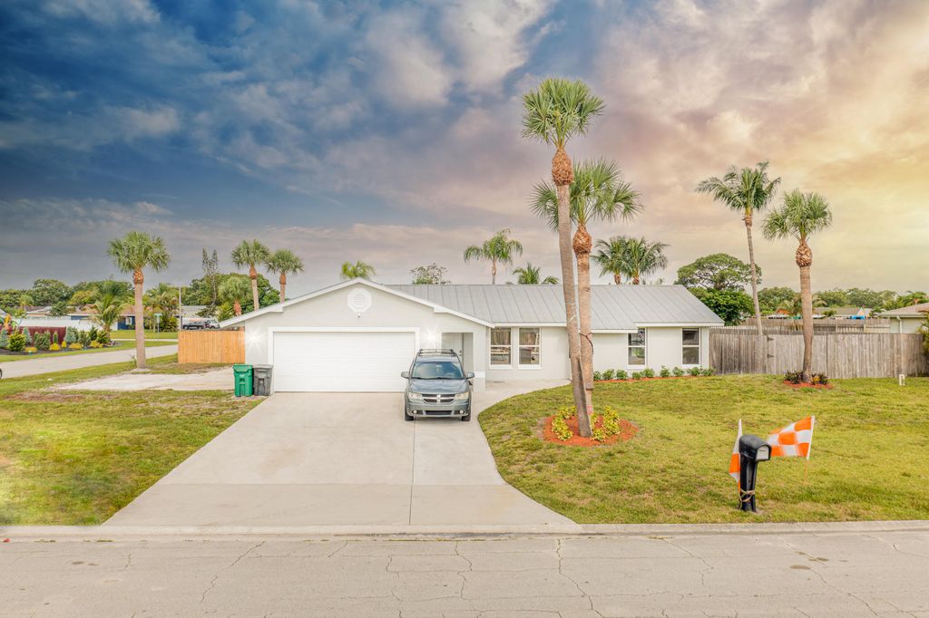 Photo of 2068 SE Triumph Road, Port Saint Lucie, FL 34952 (MLS # R10804608)