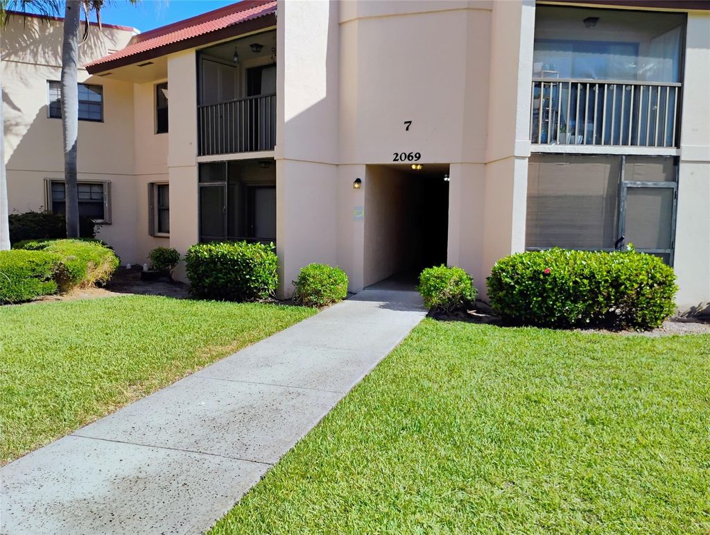 Photo of 2069 NE Collins Circle #7-1, Jensen Beach, FL 34957 (MLS # F10509369)