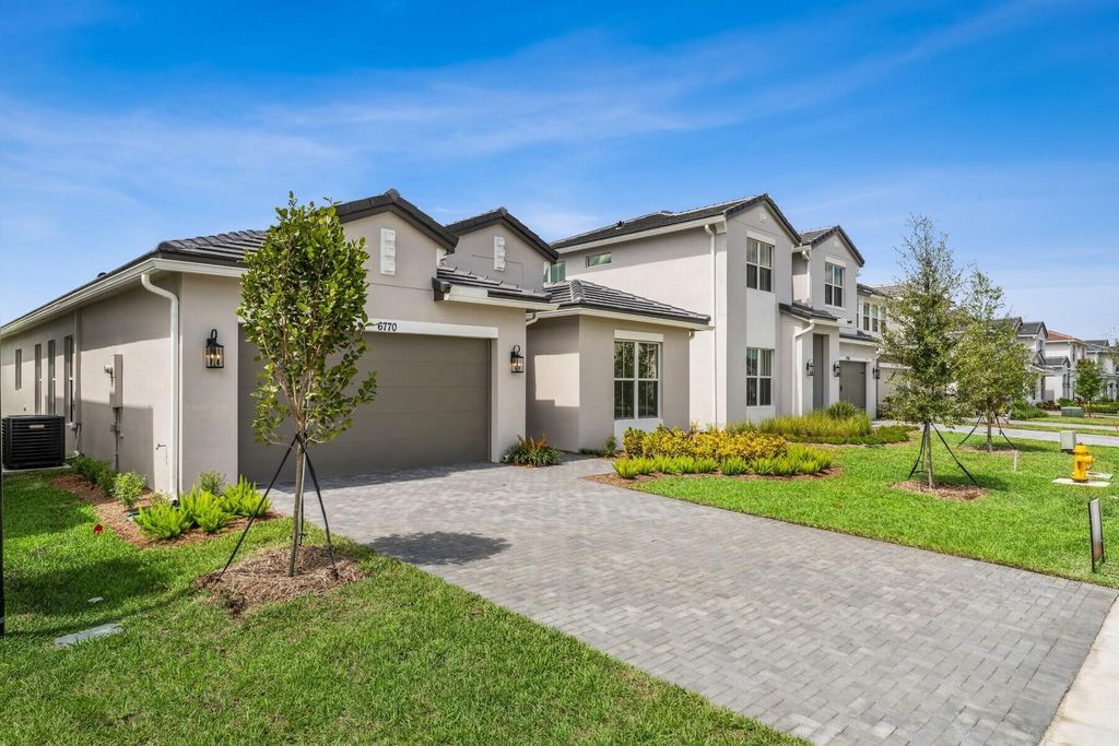 Photo of 6770 SE Lost Pine Drive #24, Stuart, FL 34997 (MLS # R11114704)