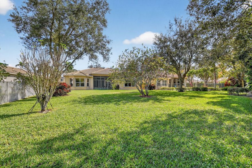 The WOW Factor! This enormous lot is set on a cul-de-sac with its own charming gazebo. The property offers a backyard that feels like a private garden estate with serene lake views. Built in 2007 the spacious Madrid IV features 4 BR 2.5 BTH with the 4th BR currently used as a den. The oversized kitchen with center island & breakfast area opens to the family room, showcasing sweeping views of the picturesque backyard. With plenty of room for a future pool or custom outdoor retreat, this home invites you to enjoy the ultimate Florida lifestyle. Enjoy peace of mind with 2 zone HVAC, electric vehicle charger, & accordion hurricane shutters. Valencia Shores offers an active 55+ lifestyle, with something for everyone! You have found it all*Luxury*comfort*security & fun at this 55+ community!