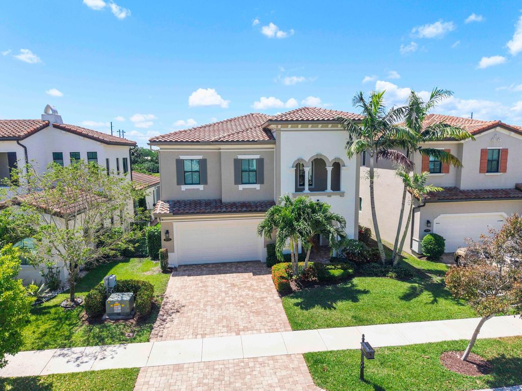Photo of 8723 Grand Prix Lane, Boynton Beach, FL 33472 (MLS # B26023289)