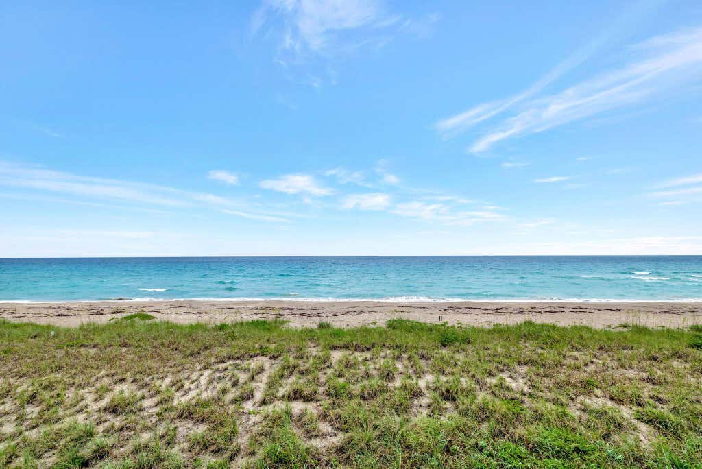 Photo of 10310 S Ocean Drive #305, Jensen Beach, FL 34957 (MLS # B26038796)