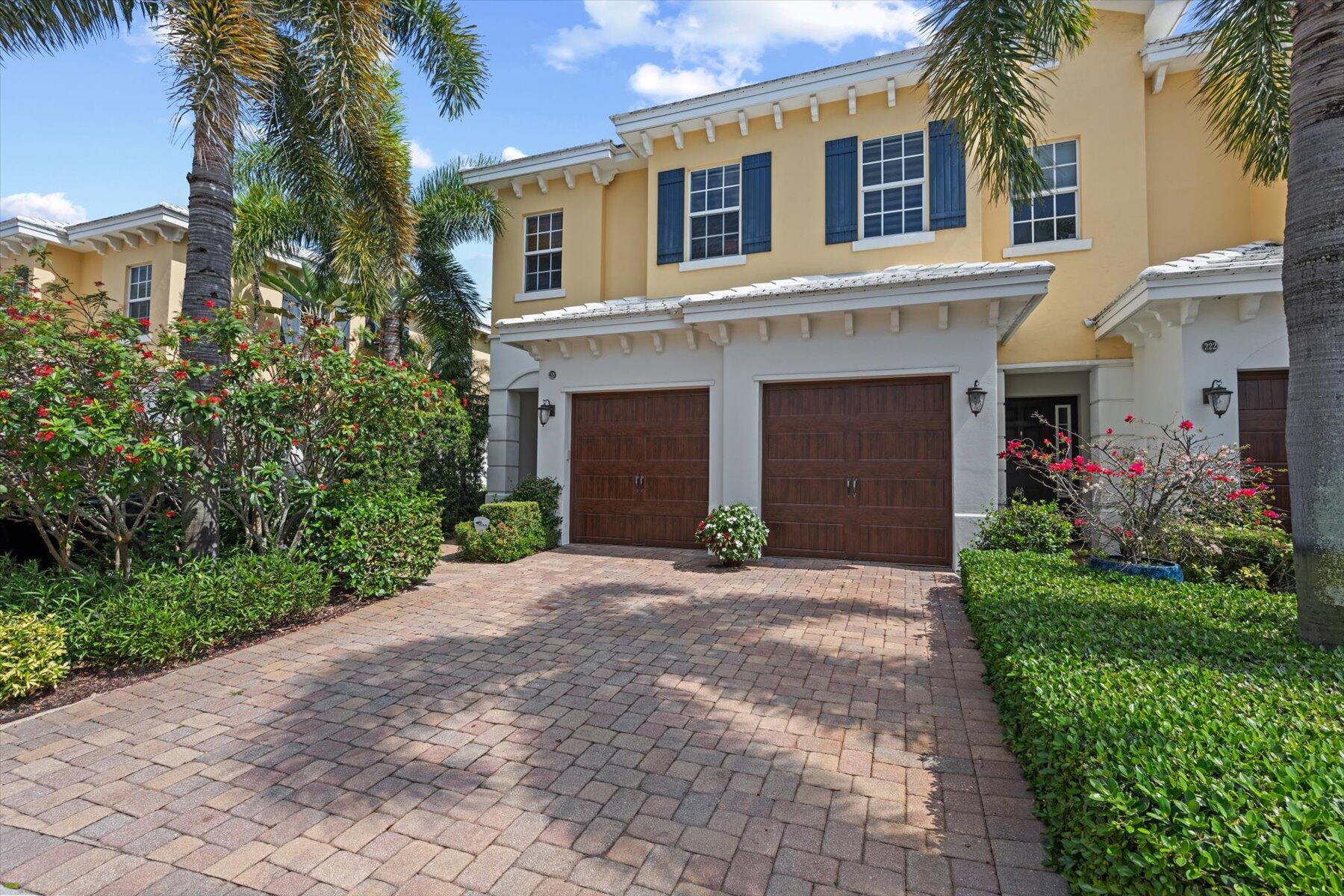 3BD + Office / 3.5BA / 2CG - Luxurious completely renovated corner town home in the boutique North Palm Beach neighborhood Mariner Ct. Featuring impact windows & doors, volume 10ft ceilings, stylish high end finishes, custom arch ways, upgraded travertine floors, plantation shutters, art lighting, tray ceilings, oversized moldings & baseboards, & impressive custom kitchen with illuminated cristallo quartz counters and Thermodore appliances. Very spacious with ample storage, high end quality felt thoughout. The backyard is lushly landscaped offering privacy a pool and spa. Close to the best restaurants, beaches, and golf courses. Townhouse style that lives like a maintenance free condo with dues including Common Areas; Insurance-Bldg; Lawn Care; Maint-Exterior; Sewer; Water, & Tras