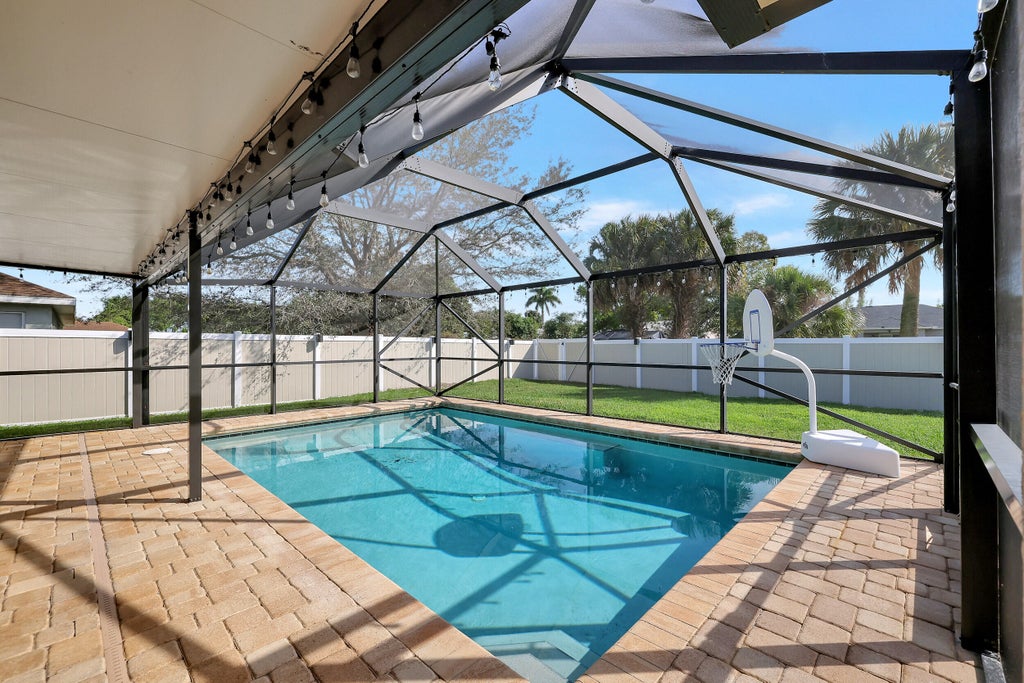 Photo of 918 SW Jeremko Avenue, Port Saint Lucie, FL 34953 (MLS # R10943136)