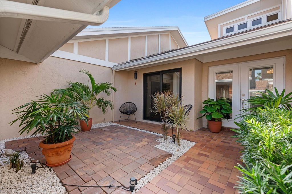 Photo of 3704 Cape Pointe Circle, Jupiter, FL 33477 (MLS # R10955513)