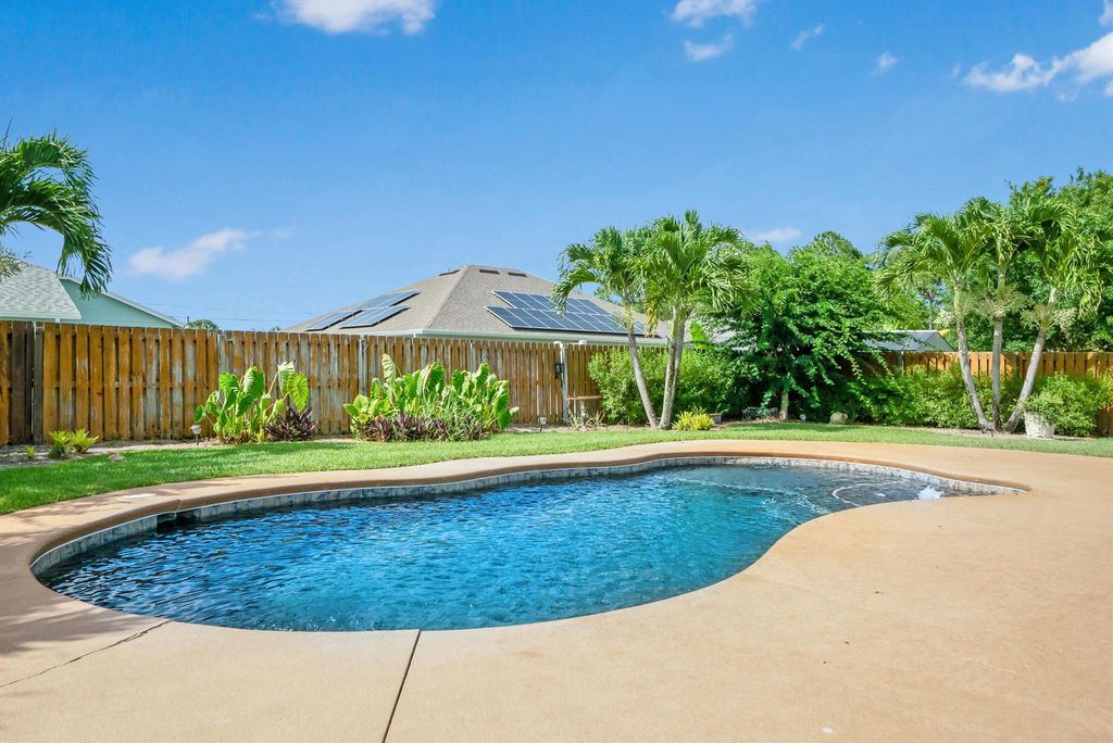 Photo of 6162 NW Deville Circle, Port Saint Lucie, FL 34953 (MLS # R11003733)