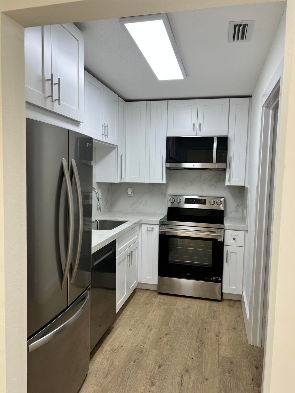 Photo of 8500 NW 59TH Street, Tamarac, FL 33321 (MLS # B26079993)