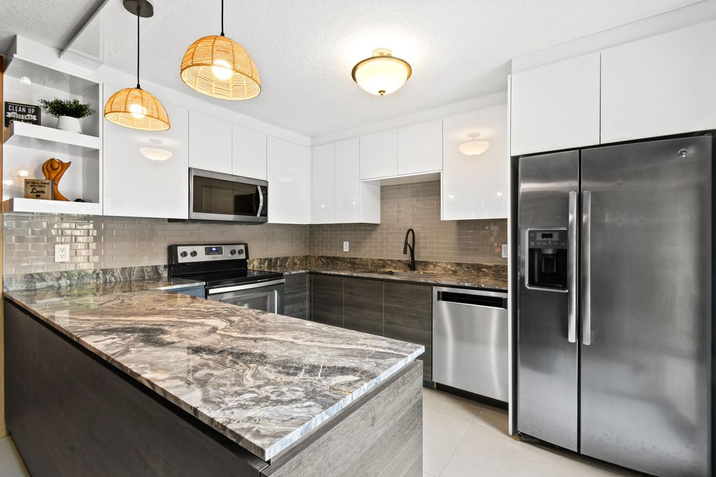 Photo of 3587 Silver Lace Lane #59, Boynton Beach, FL 33436 (MLS # R10997378)