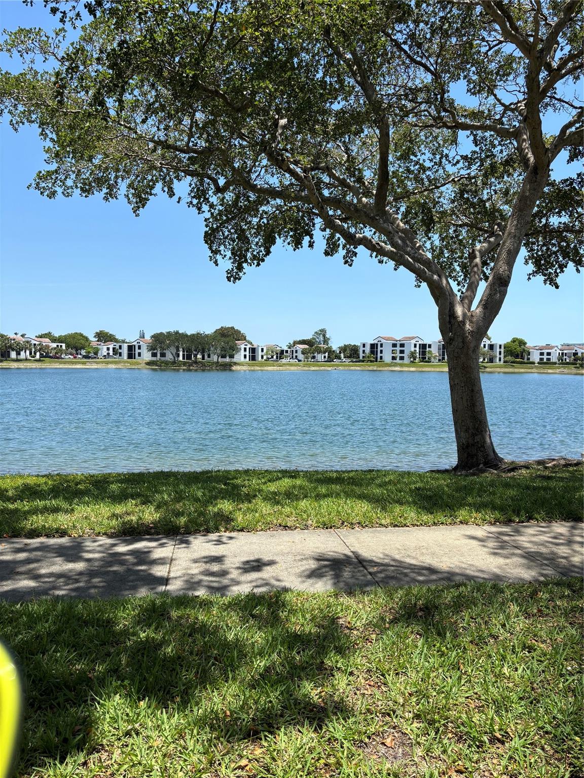 Gated, all ages resort style community with pools, tennis and basketball courts. Larger floor plan unit in the complex. FIRST floor! Remodeled 2 baths / 2 baths . All brand new appliances and washer -dryer inside the unit. Freshly painted . Gorgeous lake views from big master bedroom and living areas. Screened in porch to relax and enjoy direct lake views. Swimming pool and bbq just steps from the unit. Investors can lease out right away. 2024 roof and all work done and finished in 2025. Seller will pay assessments at closing ( about 11,000.00).
Also for rent : $2,000.00 a month