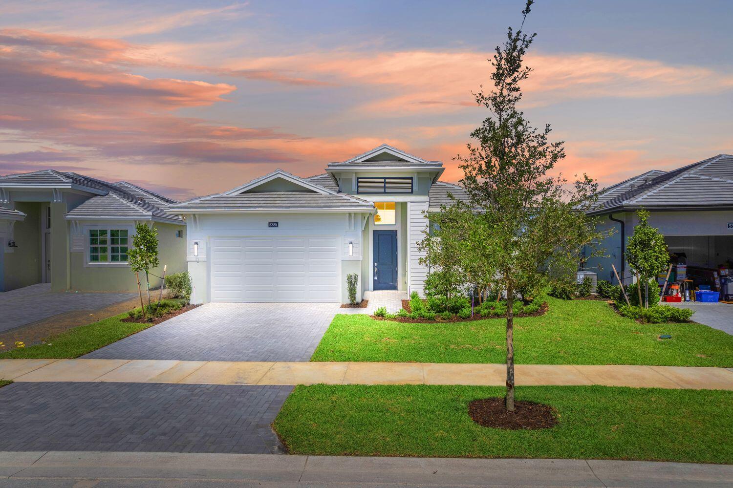 **New Construction** This brand-new Julia floorplan, built by Kolter Homes, is situated on a waterfront homesite in Westlake's only gated 55+ community. The home includes 2 bedrooms, 2 bathrooms, and a 2-car garage. The home also includes gas cooking in the kitchen along with a 3'' thick quartz kitchen island and second tier upper cabinets. This Julia comes with the deluxe extended owners shower, spray foam insulation, under cabinet LED lighting, and a laundry tub rough-in connection. The home also includes a 5' privacy wall on the lanai with connections for gas, water and electric for a future summer kitchen.
