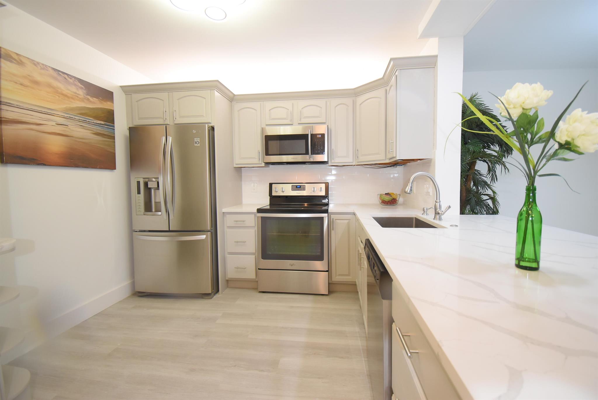 Nestled away in Boca Raton's Tranquil Community of Town Villas, this Amazing Villa embodies the lifestyle that you crave for you & your family! This Beauty Has 2 Bedrooms 2 Bathrooms with a Garage! Enjoy relaxation from the front covered screened porch! This Home is Complemented by Contemporary Kitchen, and it has a Great Flow! You'll never tire of being able to cozy up day or night in the comfort of this fully Updated Paradise! Incredible location surrounded by South Florida's finest shopping, dining and entertainment!! Close to the beach and downtown Boca Raton! Town Villas includes Great Amenities like clubhouse with pool, jacuzzi, tennis court. Allowed to rent after 18 months ownership! Don't miss your chance at peace :-) or is it your piece of paradise!?!?